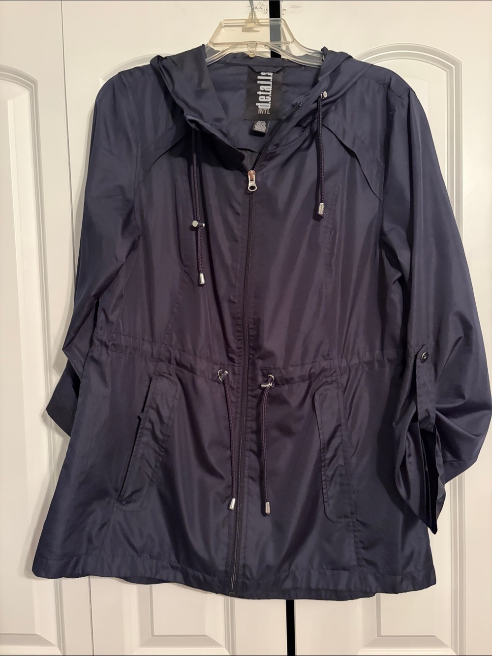 INTL details Navy Hooded Utility rainJacket
